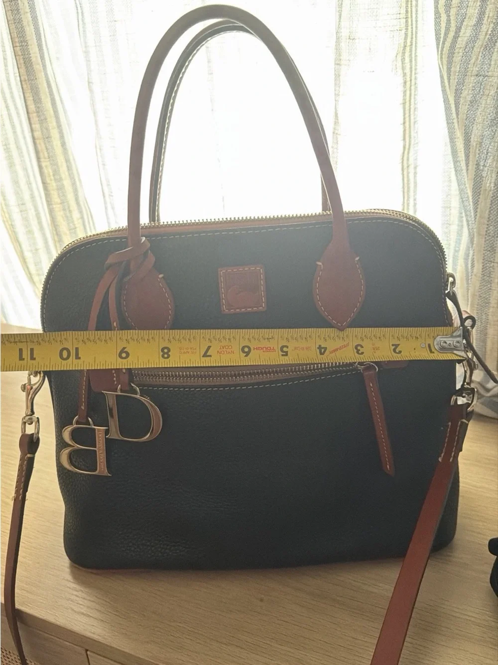 Dooney & Bourke Black Pebbled Leather Satchel with Tan Trim